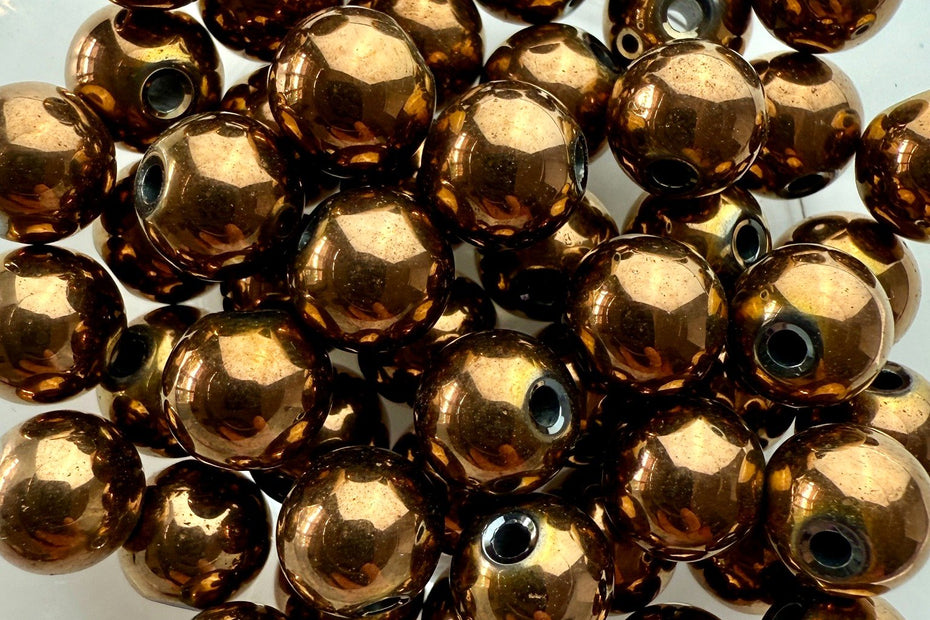 Facettierte Hämatit-Perlen in glänzendem Gold – ideal für exklusive Schmuckdesigns mit Charakter