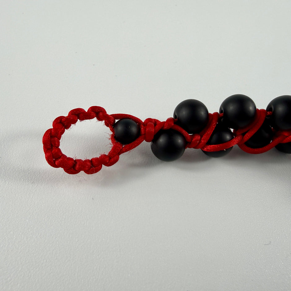 Onyx Armband zweireihig mit rotem Makramee