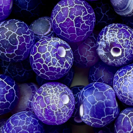 Lila Frost-Achatperlen – Edel geschliffene Achatsteine mit faszinierendem Frostmuster in Violett. Ideal für ausdrucksstarken, kunstvollen Schmuck.
