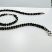 Handgefertigter Schmuck mit metallischem Glanz aus Natursteinen